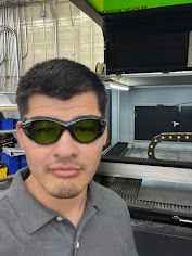 Apolonio wearing glasses headshot